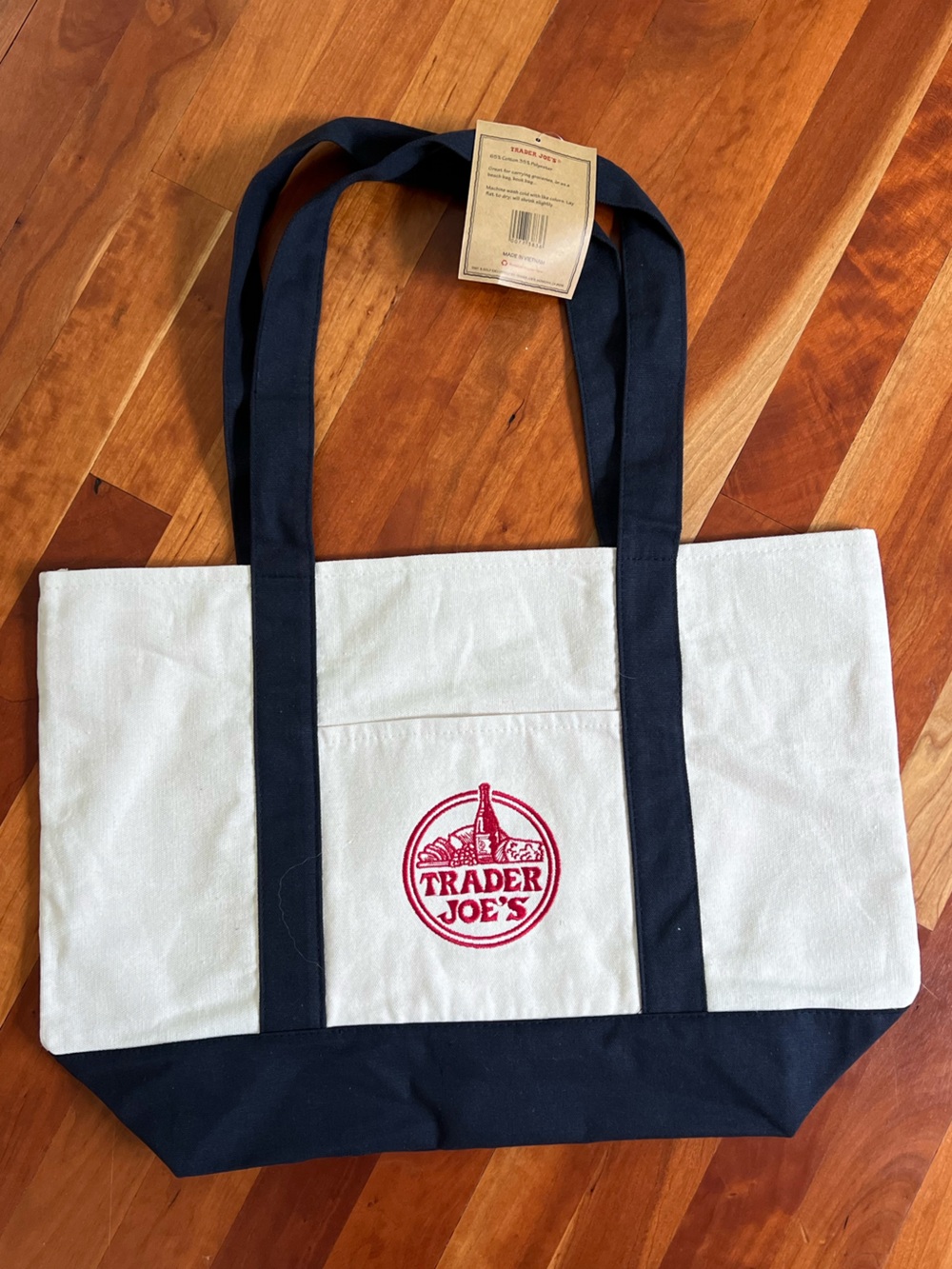 NWT Trader Joe’s Original Large Reusable Tote Bag in cream with navy blue handle - Picture 2 of 7
